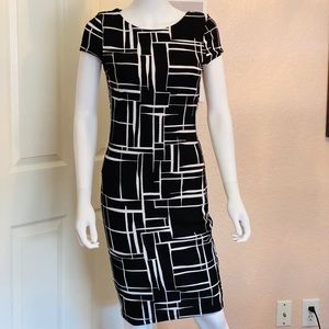 black and white body shape dress